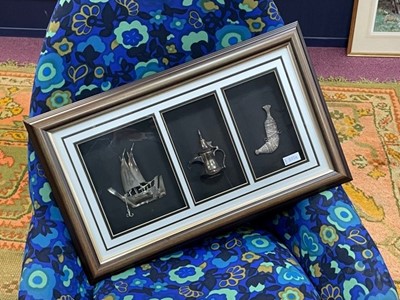 Lot 325A - A FRAMED GROUP OF SILVER DHOW, EWER AND DAGGER
