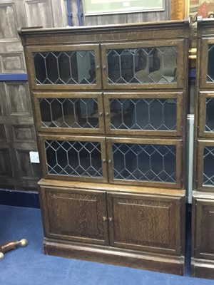 Lot 131 - AN EARLY 20TH CENTURY OAK SECTIONAL BOOKCASE
