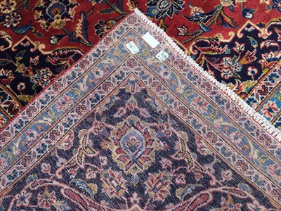 Lot 1831 - A PERSIAN HAND KNOTTED WOOL CARPET