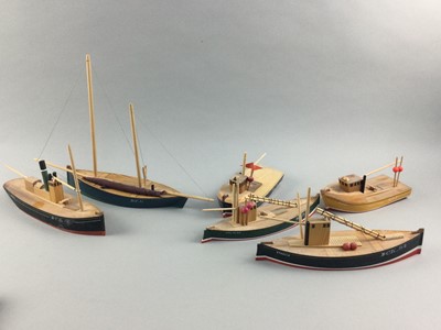 Lot 67 - A GROUP OF TEN PAINTED WOOD MODEL FISHING BOATS