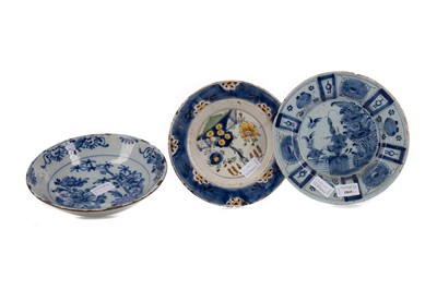 Lot 1060 - A PAIR OF 18TH CENTURY DUTCH DELFT CIRCULAR PLATES AND OTHERS