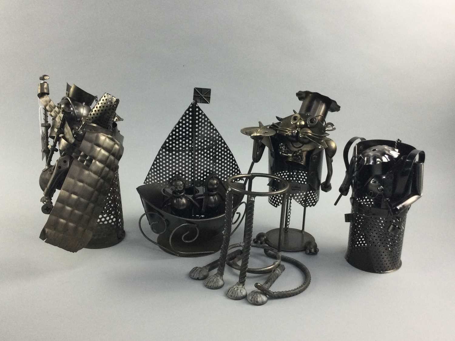 Lot 91 - A GROUP OF ART METAL BOTTLE STANDS