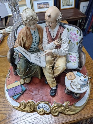 Lot 101 - A CAPODIMONTE FIGURE GROUP ALONG WITH ANOTHER