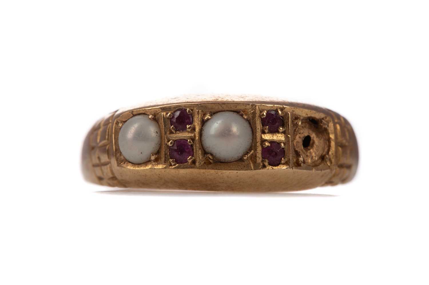 Lot 1399 - A PARTIAL PEARL AND RUBY RING