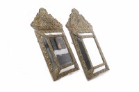 Lot 1063 - PAIR OF EMBOSSED BRASS MOUNTED CUSHION MIRRORS...