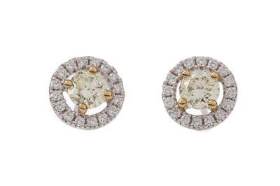 Lot 1012 - A PAIR OF CERTIFICATED YELLOW DIAMOND STUD EARRINGS