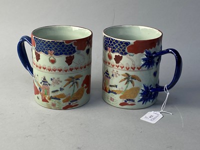 Lot 234 - A PAIR OF 20TH CENTURY CHINESE CYLINDRICAL TANKARDS
