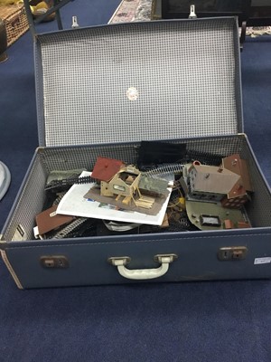 Lot 337 - A LOT OF TRAIN AND TRACK ACCESSORIES CONTAINED IN A VINTAGE SUITCASE