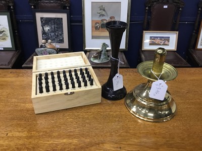 Lot 346 - A PAIR OF BRONZE CANDLESTICKS ALONG WITH A LETTER PRINTING SET