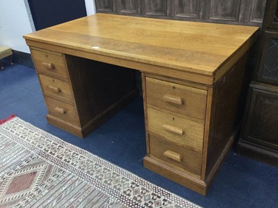 Lot 390 - AN OAK PEDESTAL WRITING DESK