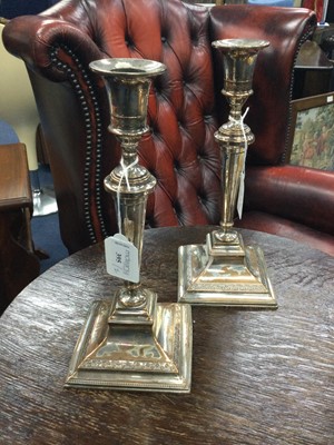 Lot 395 - A PAIR OF 19TH CENTURY SHEFFIELD PLATED CANDLESTICKS