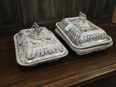 Lot 397 - A LOT OF THREE SILVER PLATED OBLONG ENTREE DISHES AND COVERS