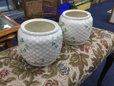 Lot 406 - A PAIR OF BELLEEK BISCUIT JARS