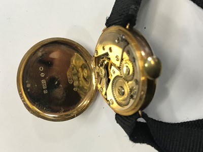 Lot 716 - THREE LADY'S NINE CARAT GOLD CASED WATCHES