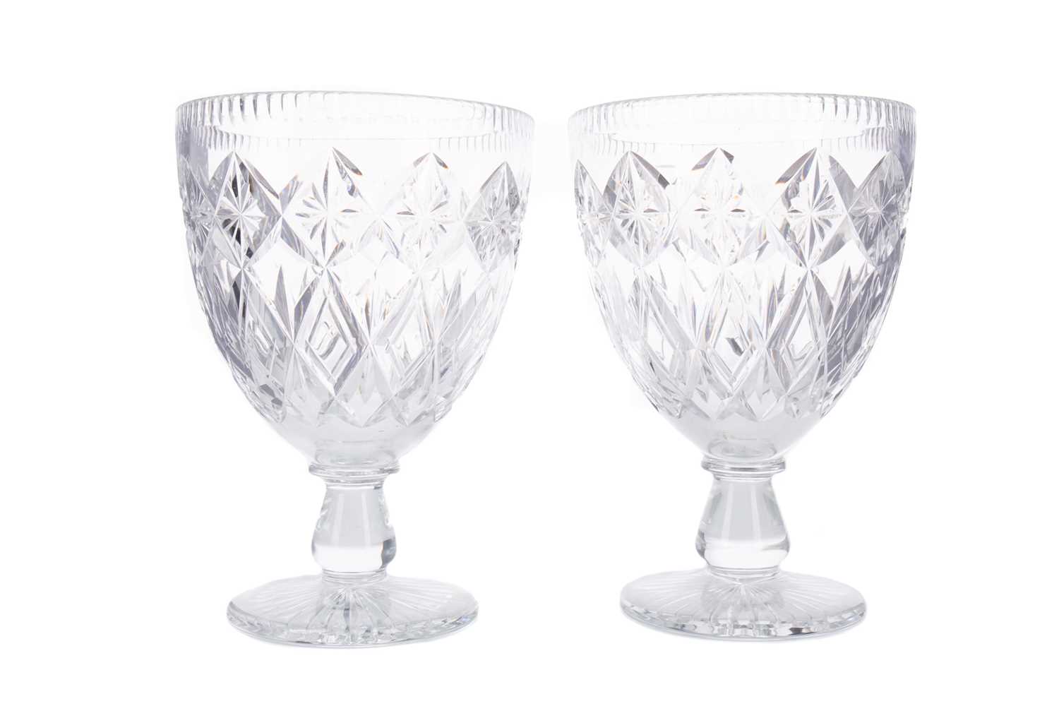 Lot 1111 - A PAIR OF CUT GLASS VASES