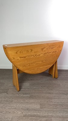 Lot 205 - AN ERCOL DROP LEAF DINING TABLE