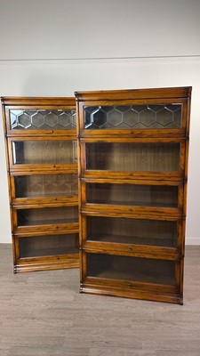 Lot 811 - A PAIR OF OAK SECTIONAL BOOKCASES