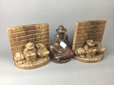 Lot 71 - A GROUP OF PERUVIAN CARVED WOOD FIGURES AND BOOKENDS
