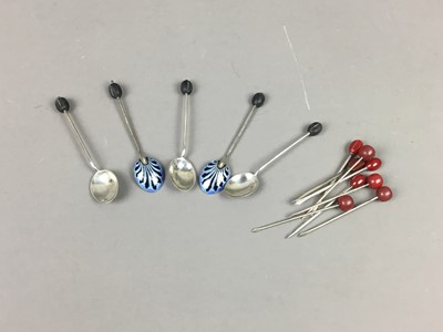 Lot 91 - A SET OF FIVE SILVER AND ENAMEL TEASPOONS ALONG WITH EIGHT SILVER TOOTHPICKS
