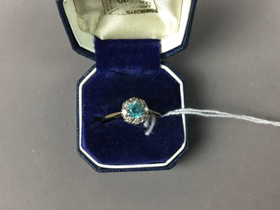 Lot 101 - A ZIRCON AND DIAMOND CLUSTER RING