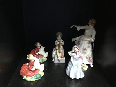 Lot 246 - A ROYAL WORCESTER FIGURE OF 'SATURDAY'S CHILD' AND FOUR ROYAL DOULTON FIGURES