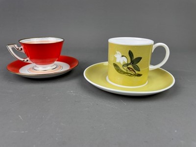 Lot 220 - A SUSIE COOPER 'HARLEQUIN' COFFEE CUPS AND SAUCERS AND ANOTHER