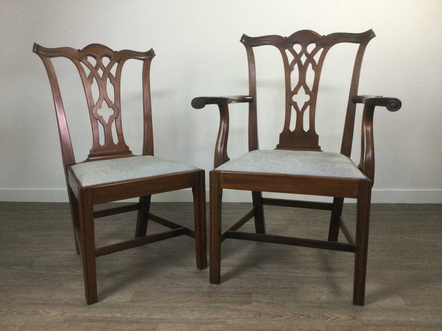 Lot 826 - A SET OF EIGHT MAHOGANY DINING CHAIRS OF CHIPPENDALE DESIGN