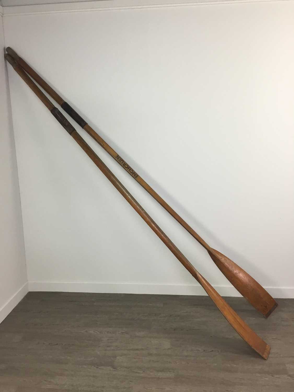 Lot 33 - A PAIR OF BOAT OARS AND AN ANCHOR