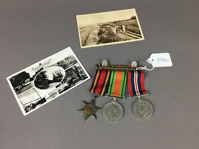 Lot 253 - A FRAMED GILDER PILOT PLAQUE, MEDALS AND VINTAGE POSTCARDS