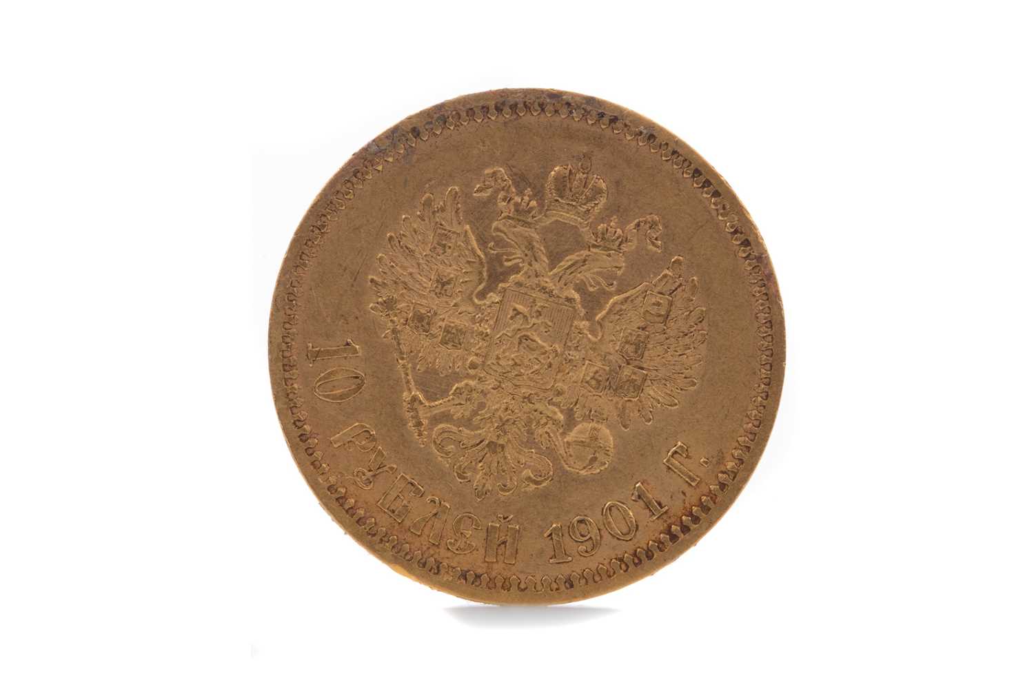 Lot 10 - A GOLD 10 RUBLE COIN DATED 1901