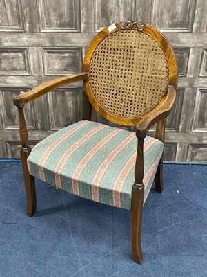 Lot 259 - A WALNUT CANE BACK ARMCHAIR