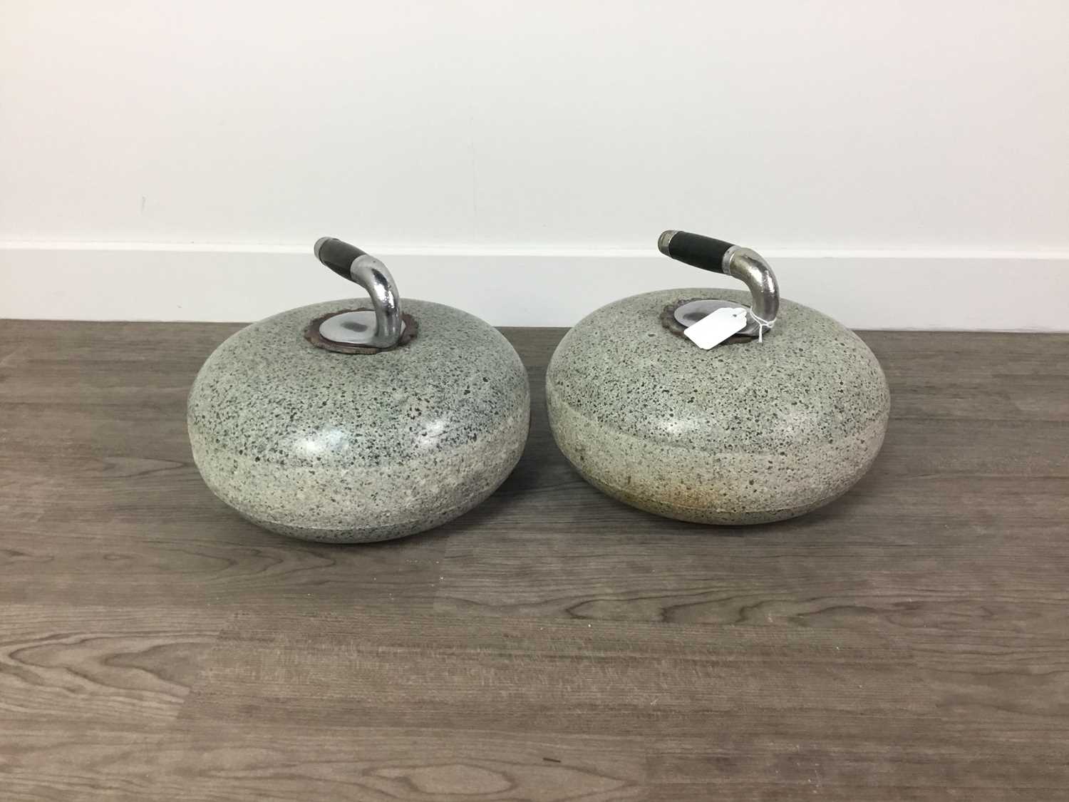 Lot 844 - A PAIR OF CURLING STONES