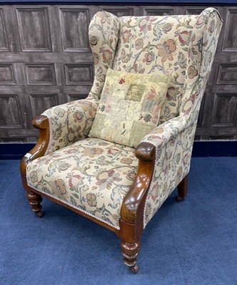 Lot 330 - AN VICTORIAN UPHOLSTERED WING BACK ARMCHAIR