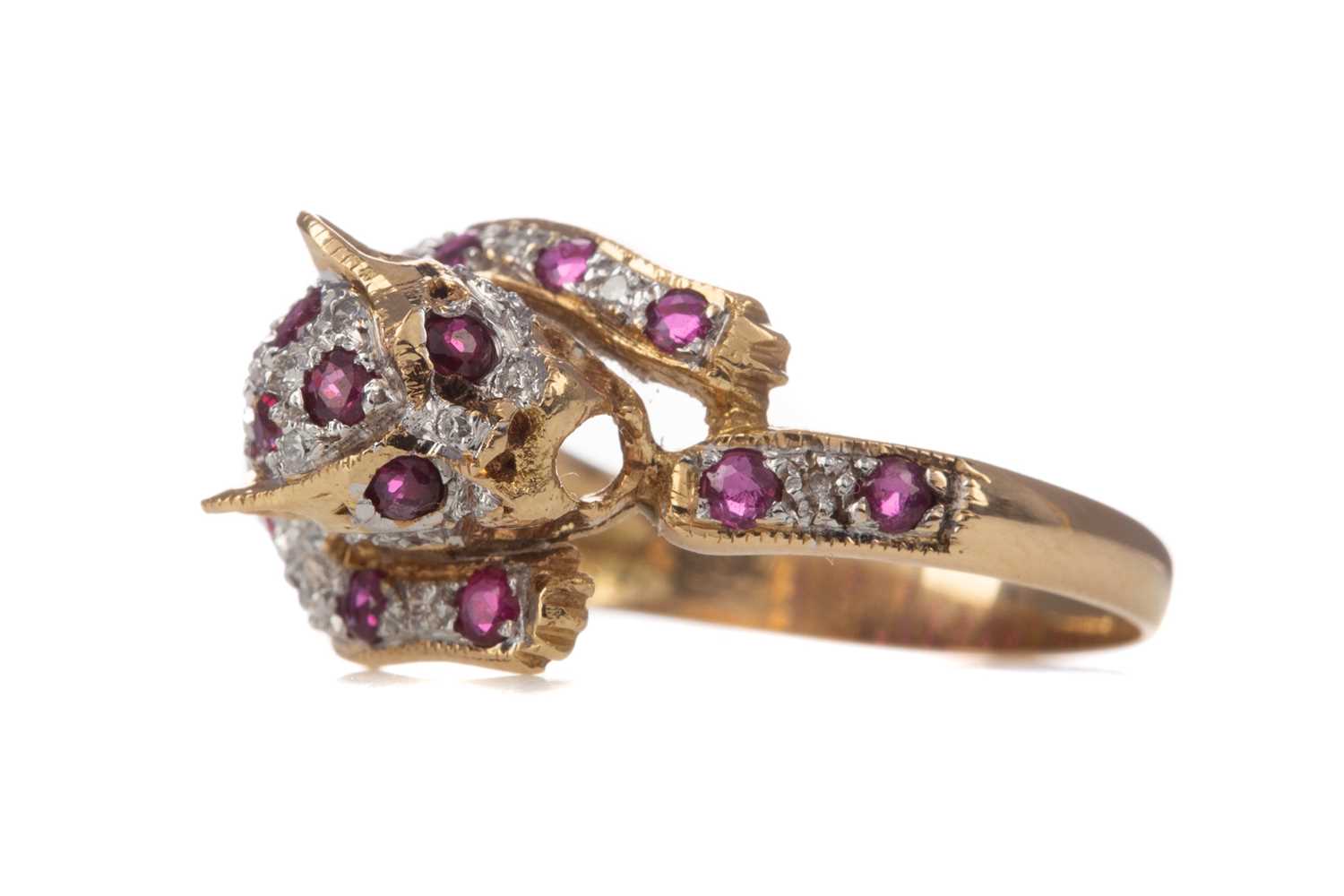 Lot 345 - A RUBY AND DIAMOND PANTHER RING