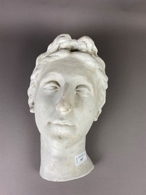 Lot 307 - A STUCCO SCULPTURE OF A FEMALE HEAD