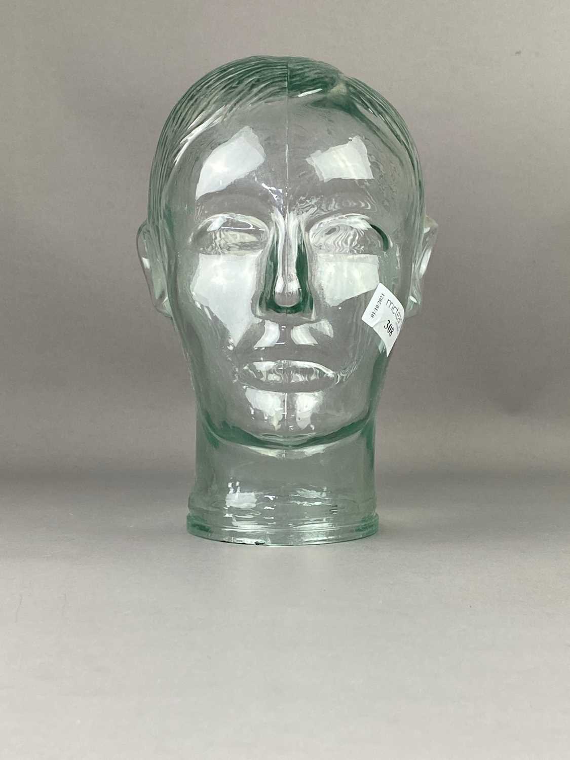 Lot 308 - A MOULDED GLASS MALE HEAD FIGURE