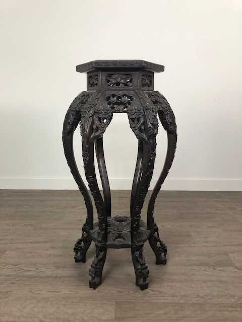 Lot 1927 - A CHINESE IRONWOOD PLANT TABLE