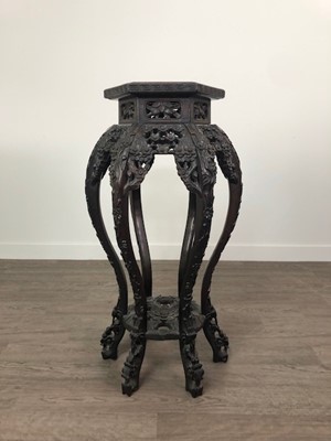 Lot 1927 - A CHINESE IRONWOOD PLANT TABLE