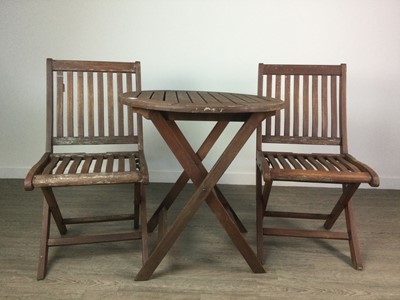 Lot 323 - A WOODEN GARDEN TABLE AND TWO CHAIRS