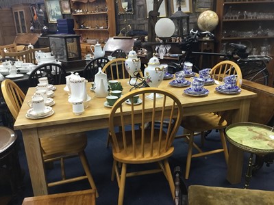 Lot 322 - A MODERN PINE KITCHEN TABLE AND FOUR CHAIRS