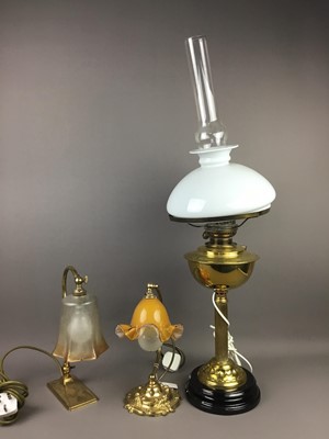 Lot 370 - A BRASS OIL LAMP AND TWO BRASS DESK LAMPS