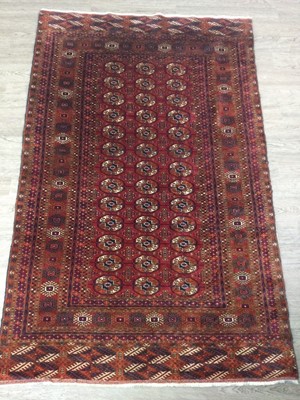 Lot 1910 - A MIDDLE EASTERN FRINGED RUG