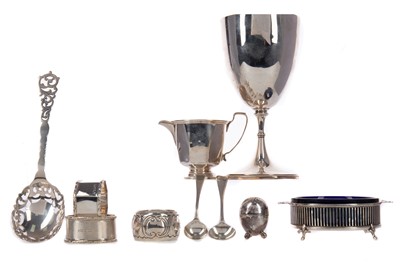 Lot 563 - AN EDWARD VII SILVER SALT, ALONG WITH A GOBLET SIFTING SPOON, AND PEPPERETTE
