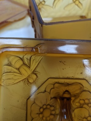 Lot 1126 - AN EARLY 20TH CENTURY AMBER GLASS PRESERVE JAR, COVER AND STAND, ALONG WITH A FROSTED GLASS JAR