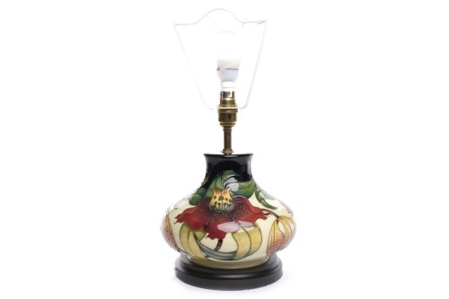 Lot 779 - MOORCROFT 'ANNA LILLY' PATTERN TABLE LAMP of...