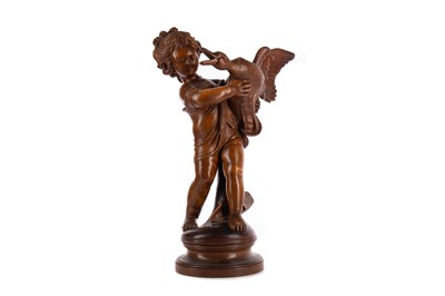 Lot 1327 - A CARVED WALNUT FIGURE OF A CHILD WITH GOOSE