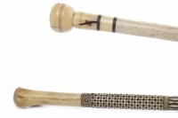 Lot 1286 - TWO EARLY 20TH CENTURY IVORY AND BONE WALKING...