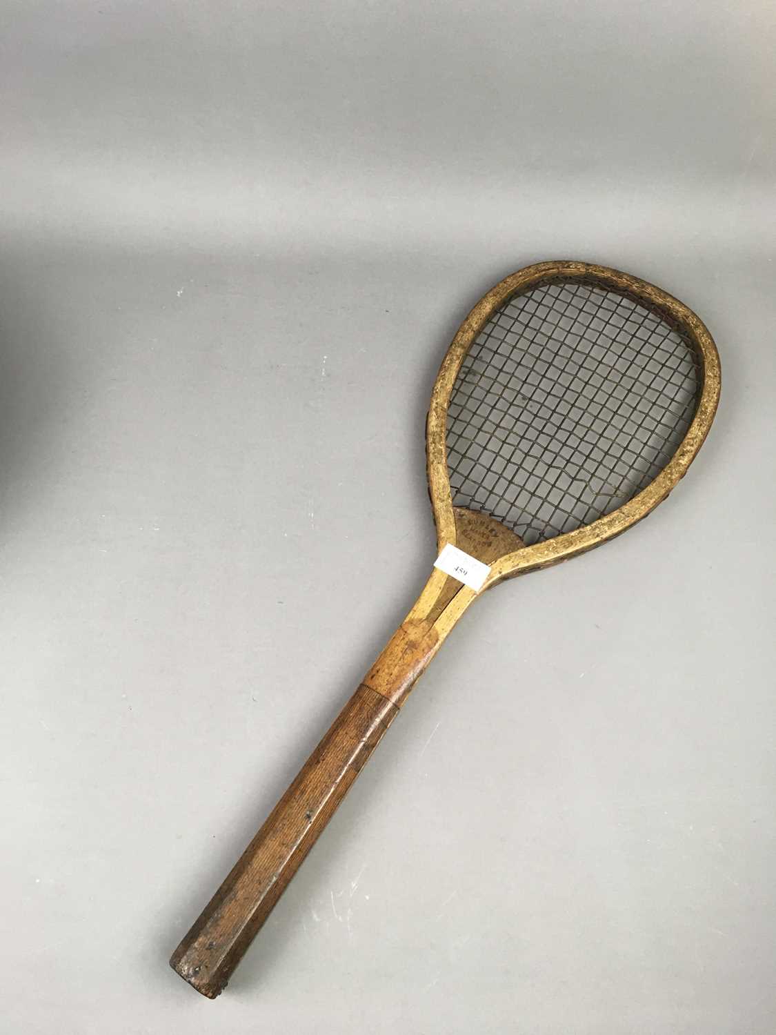 Lot 459 AN EARLY 20TH CENTURY TENNIS RACKET