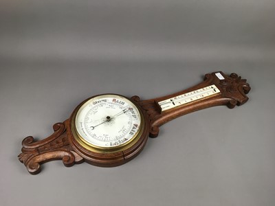 Lot 475 - A VICTORIAN OAK WHEEL BAROMETER