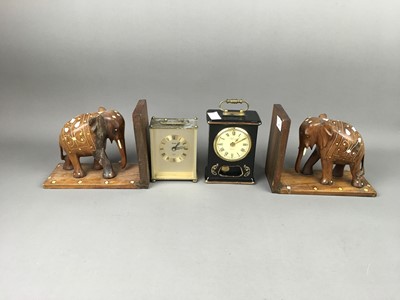 Lot 493 - A PAIR OF ELEPHANT BOOKENDS AND TWO MANTEL CLOCKS